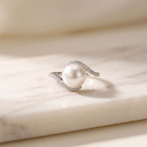 10mm baroque freshwater pearl ring on sterling silver, lying on white marble